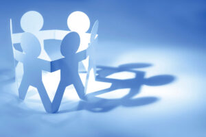 paper people cutouts holding hands